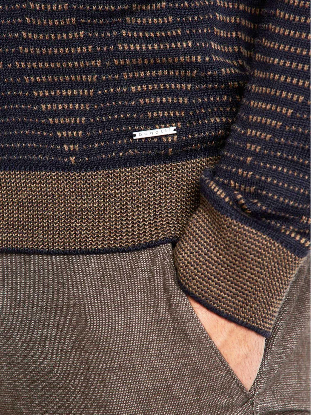 Bugatti 45530 Crew Knit, The round neck sweater with an all-over 2-tone diamond structure is a real eye-catcher. Combining timeless style and contemporary craftsmanship, the Bugatti 45530 Crew Knit exudes effortless sophistication. Enjoy the luxurious feel of the round neck sweater with its striking all-over 2-tone diamond structure, perfect for making a statement wherever you go.