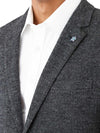 Indulge in luxury with the Uberstone Zeller Sports jacket. Made from a wool blend, this jacket boasts a skinny fit, natural shoulder, and notch lapel for a sophisticated look. The textured herringbone design in charcoal is perfect for winter and pairs well with black chinos or trousers. Elevate your style with this exclusive piece. Limited Edition (If your size is not available, call us to check suppliers warehouse, we will get back to you ASAP)